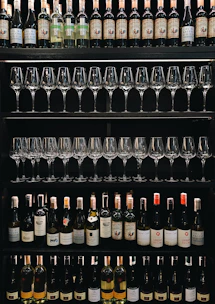 A selection of fine French wines displayed in a cellar.