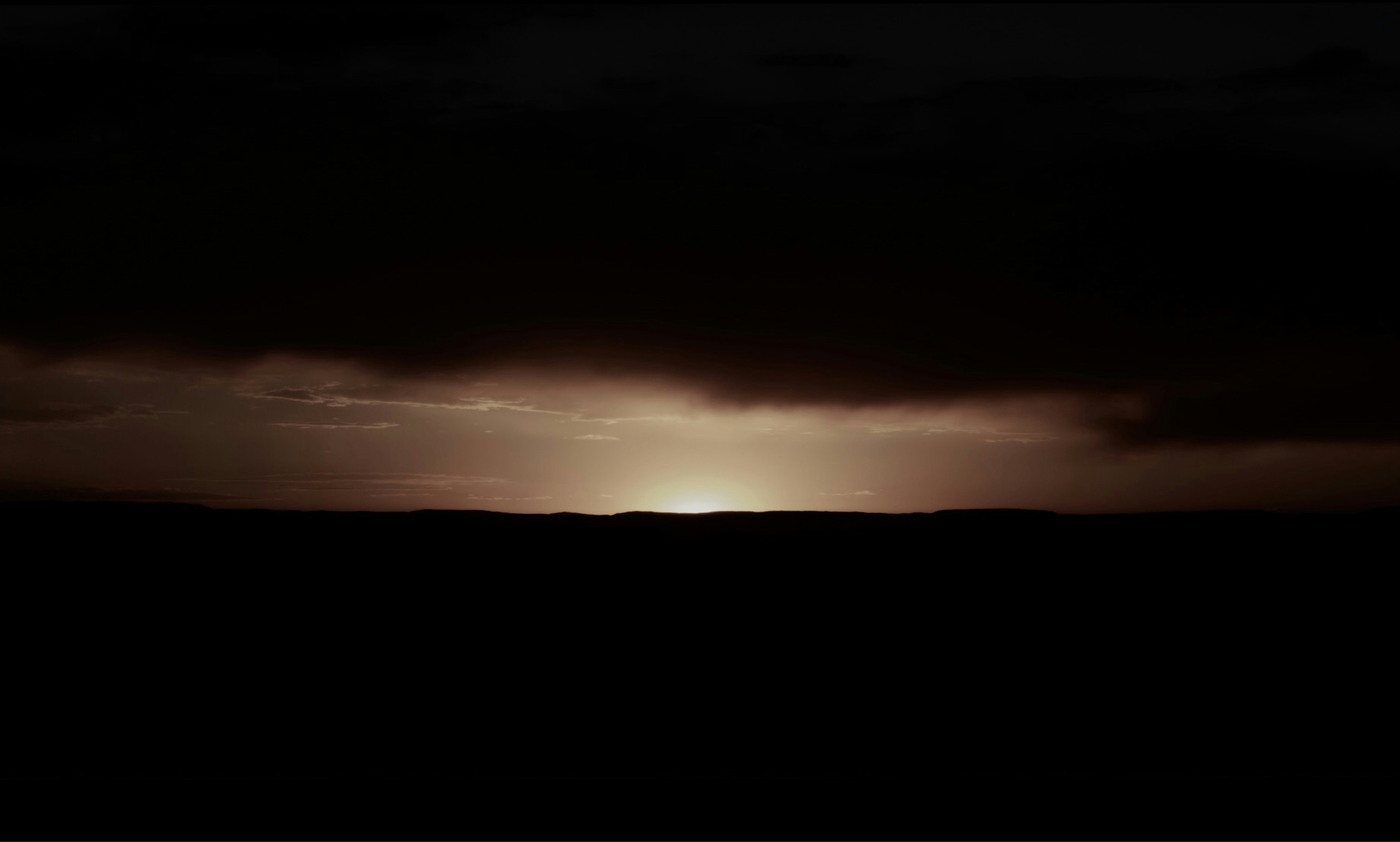 silhouette landscape photography of land and the sky
