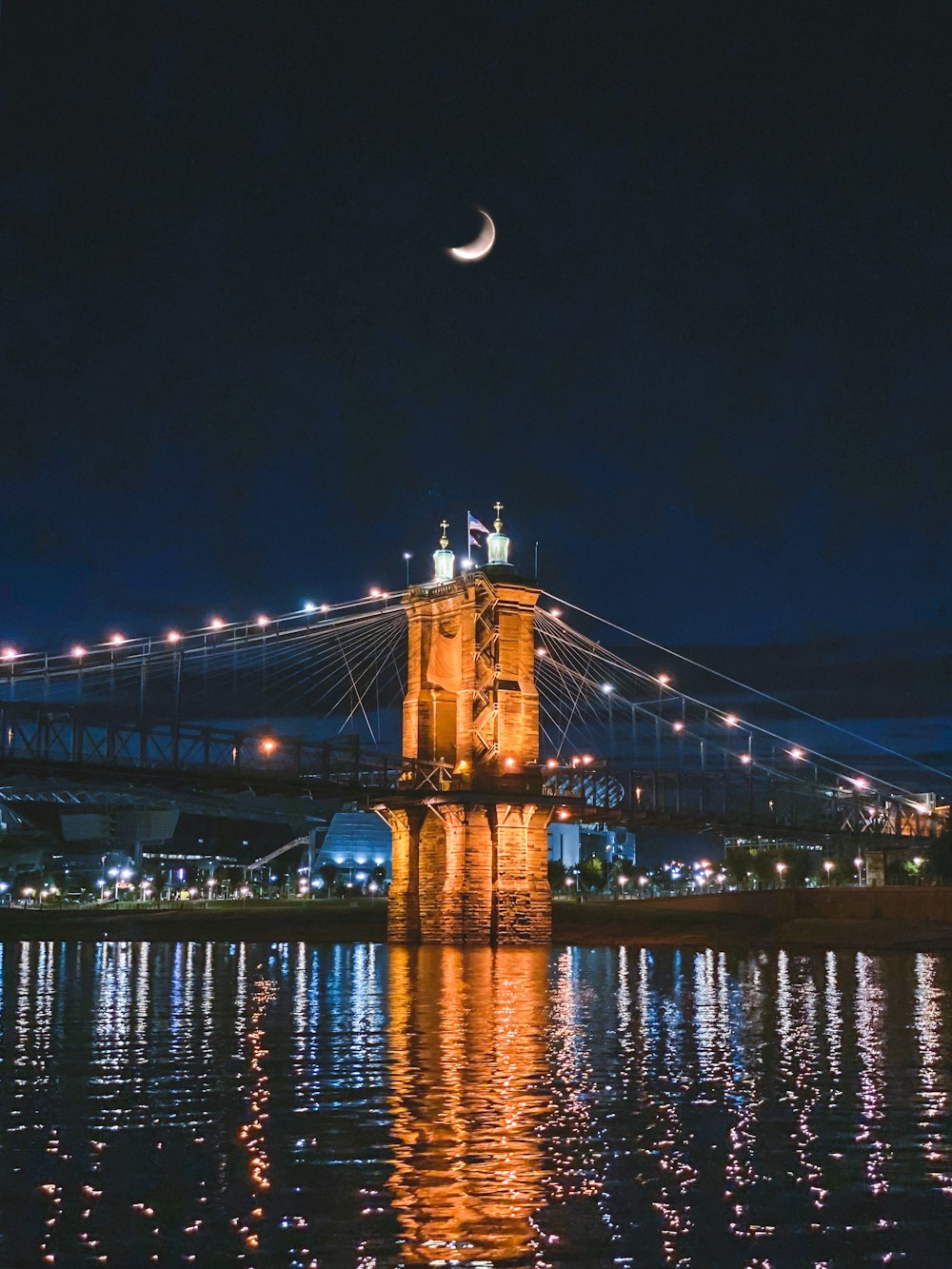 lighted bridge at night