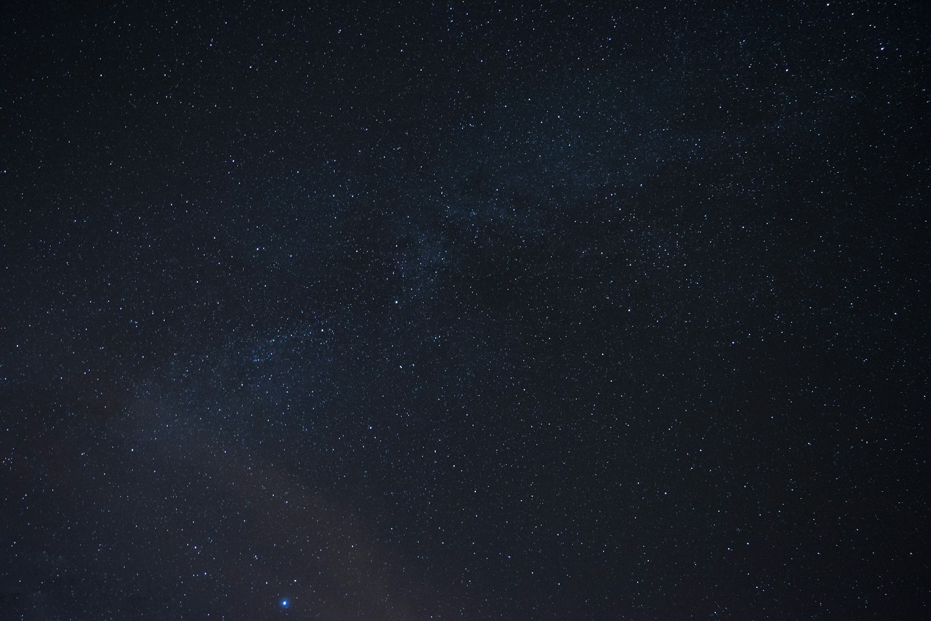 the night sky is filled with stars and bright lights