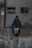 woman sitting on wall during daytime