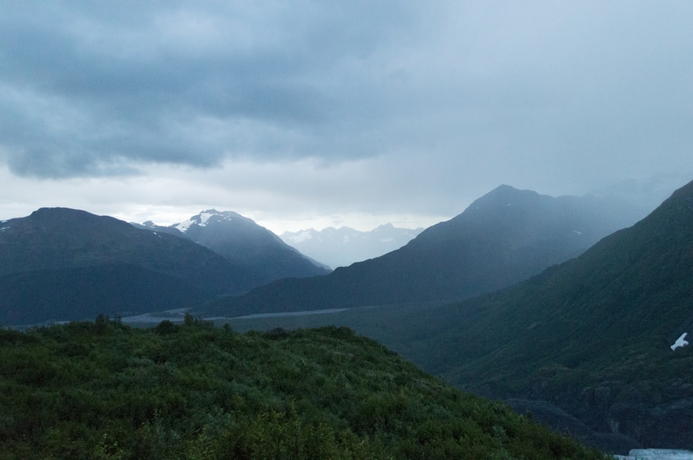 green mountains and gray clouds