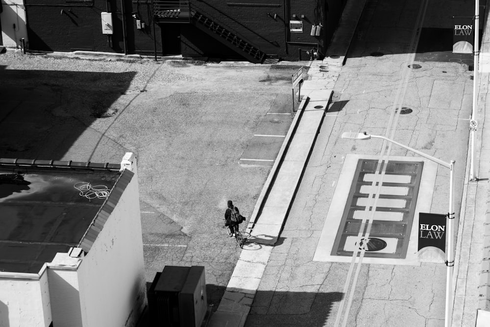 person walking on pavement