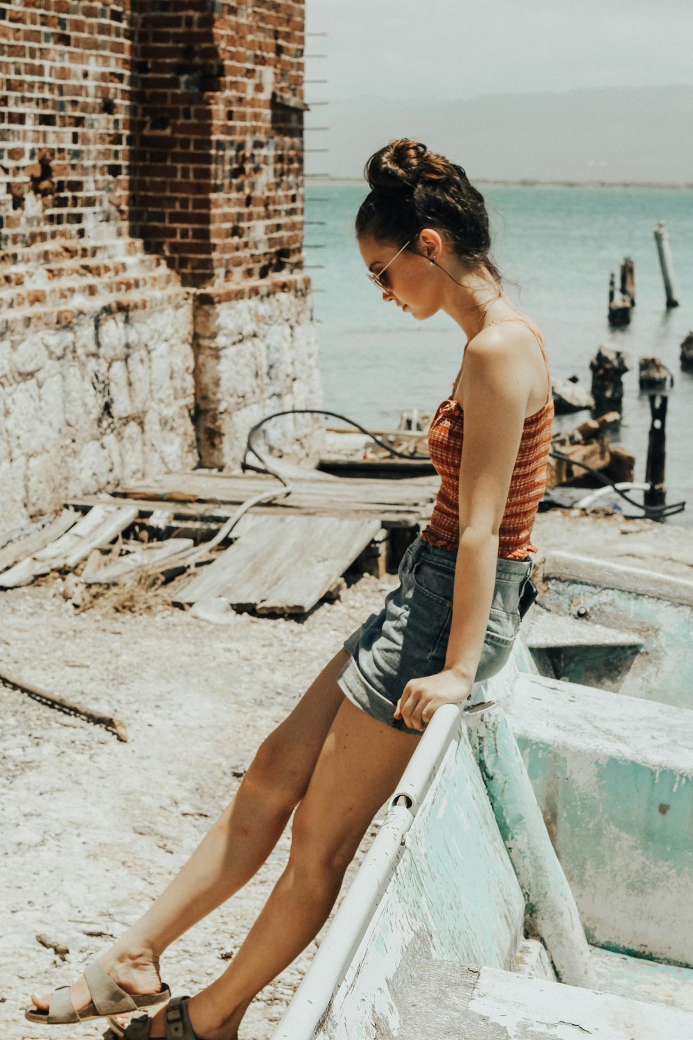 woman leaning on railing