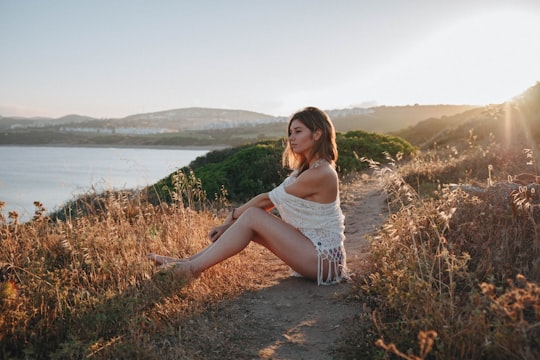 woman sitting near river in Sotogrande Spain