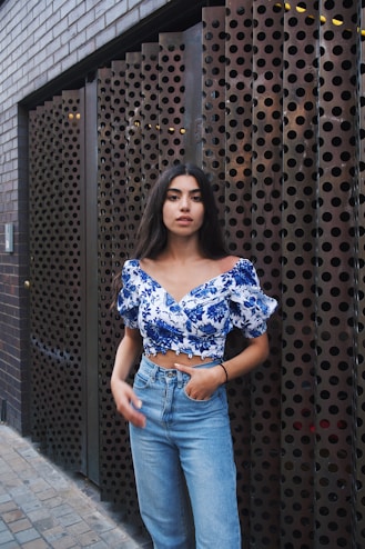 woman leaning on wall