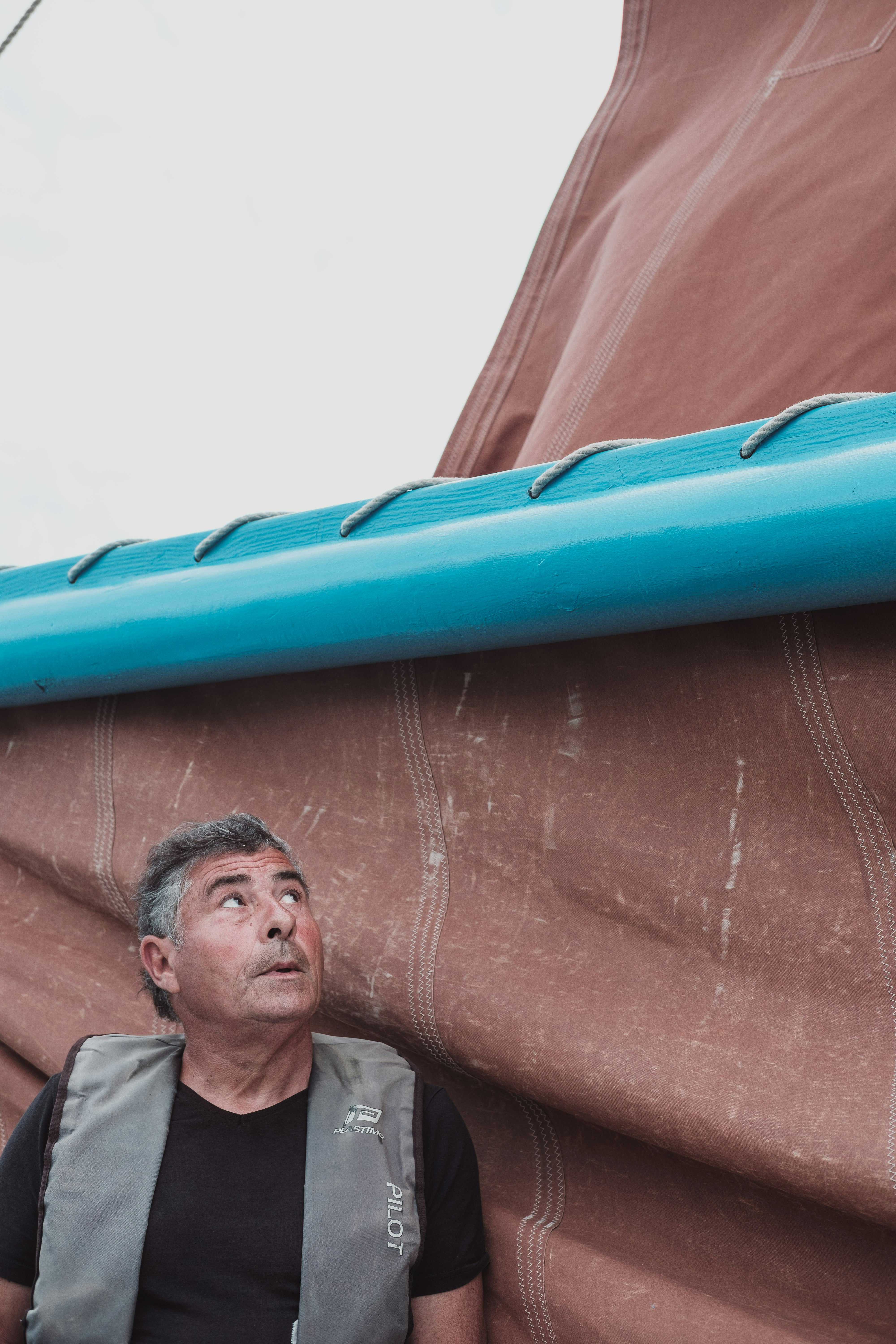 man under a blue roof