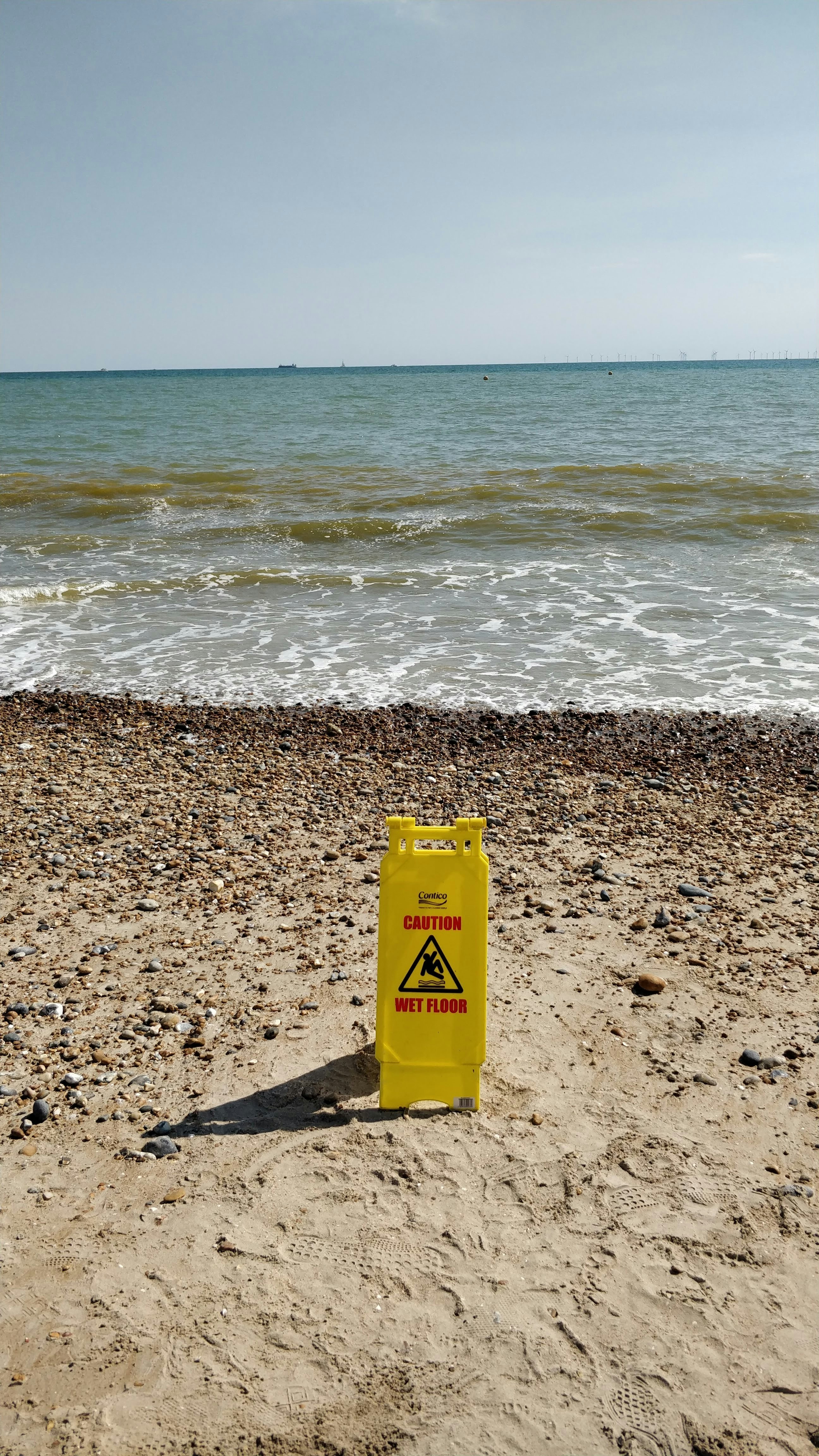 yellow early warning device on the seashore