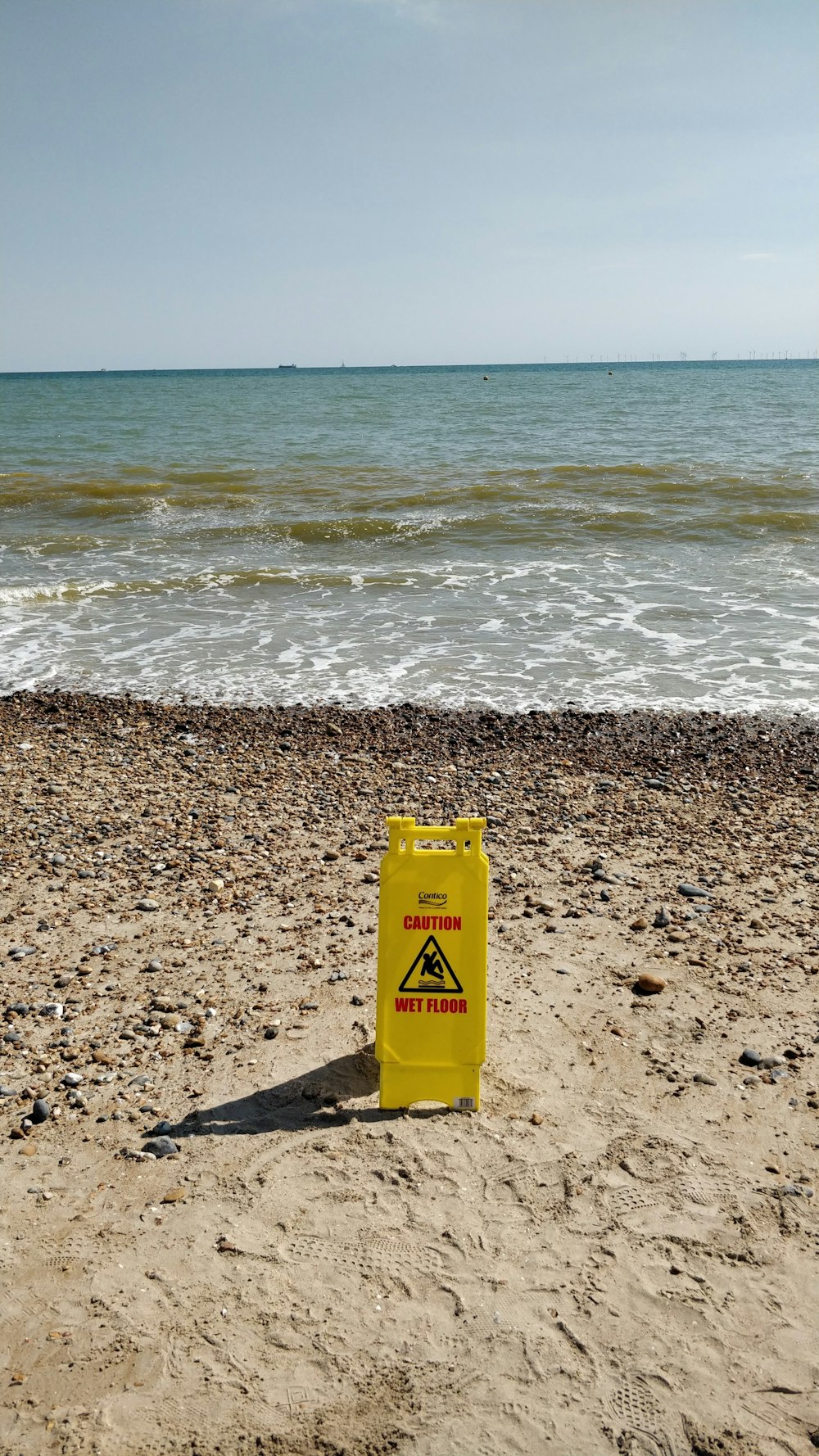 yellow early warning device on the seashore