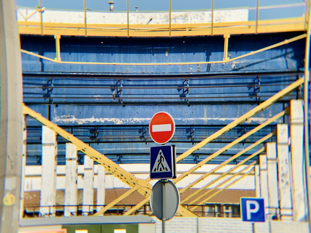 a street sign sitting on top of a metal pole