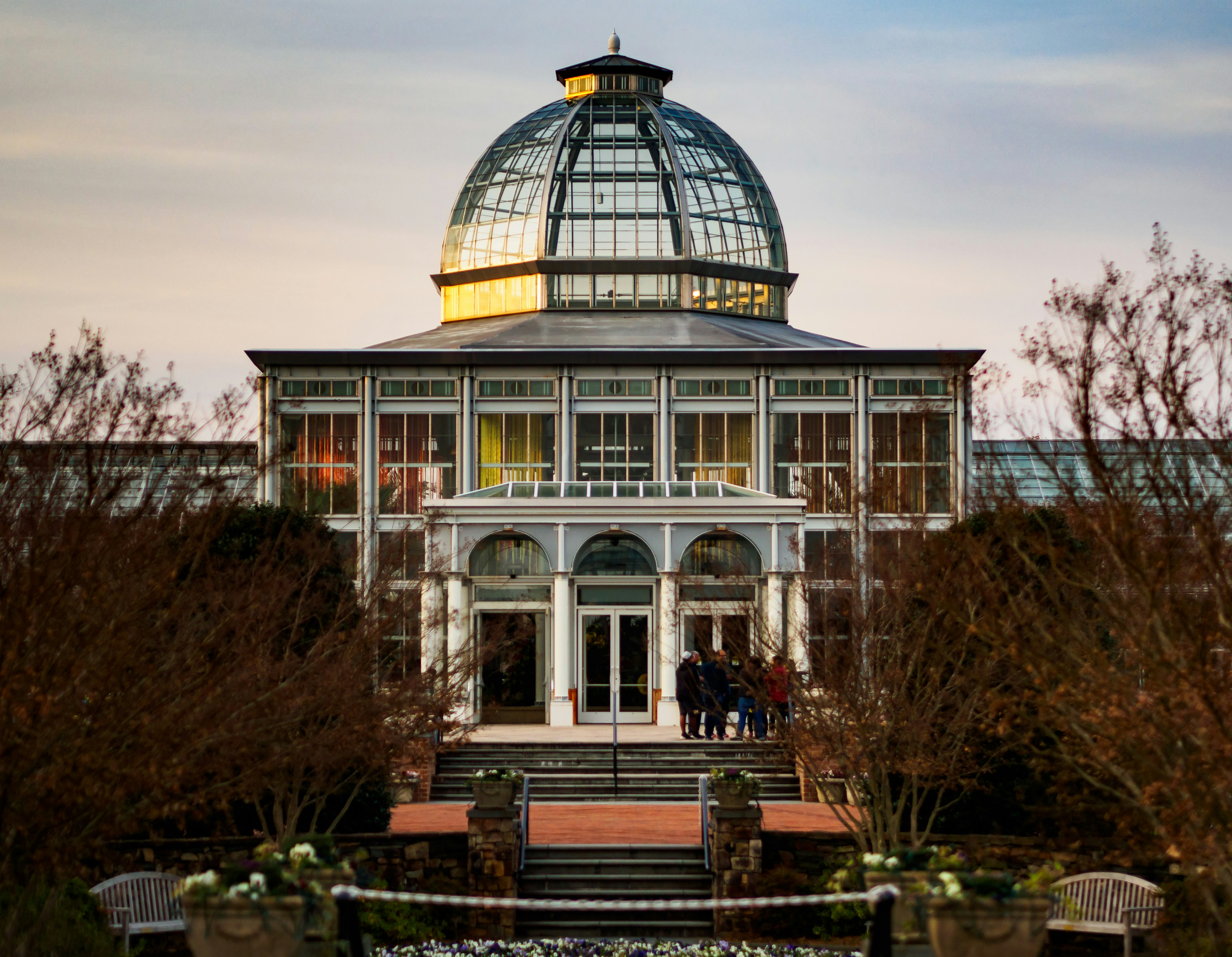 white and black dome building under a calm blue sky