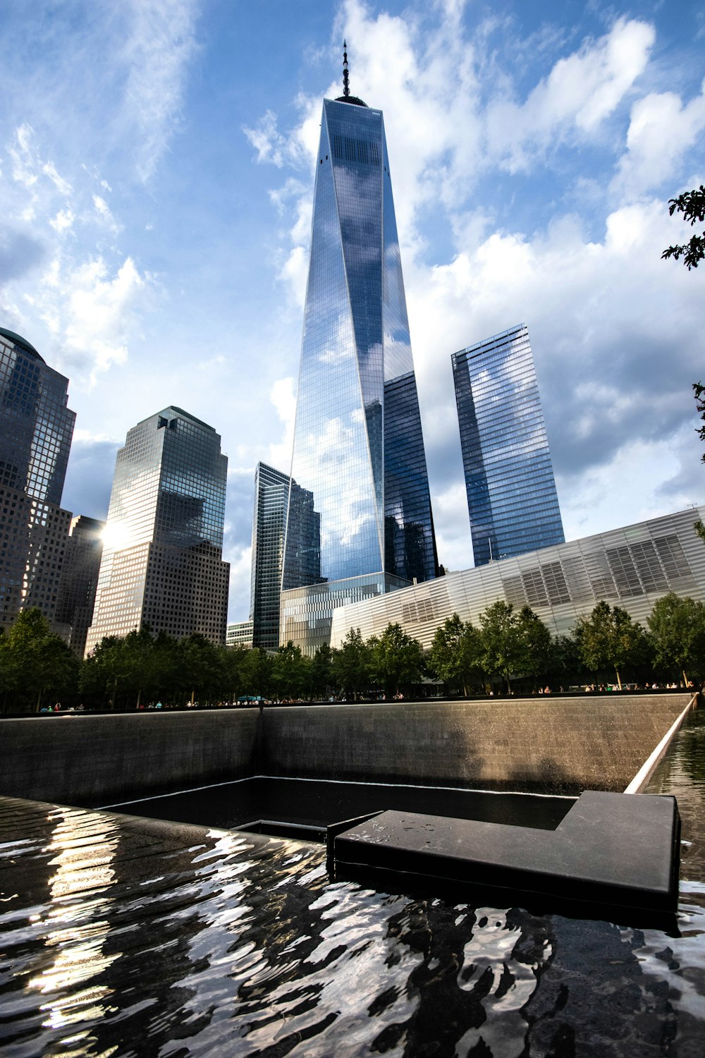 low angle photo of mirror building