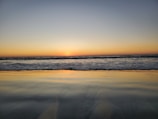 A beautiful sunset captured over a serene beach.