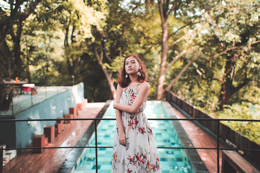 woman standing near railings