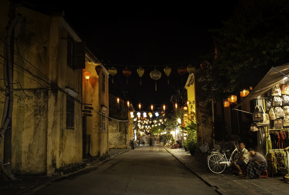 buntings hanging between buildings during nighttime