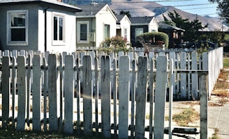 A beautiful residential fence installed in a suburban neighborhood.