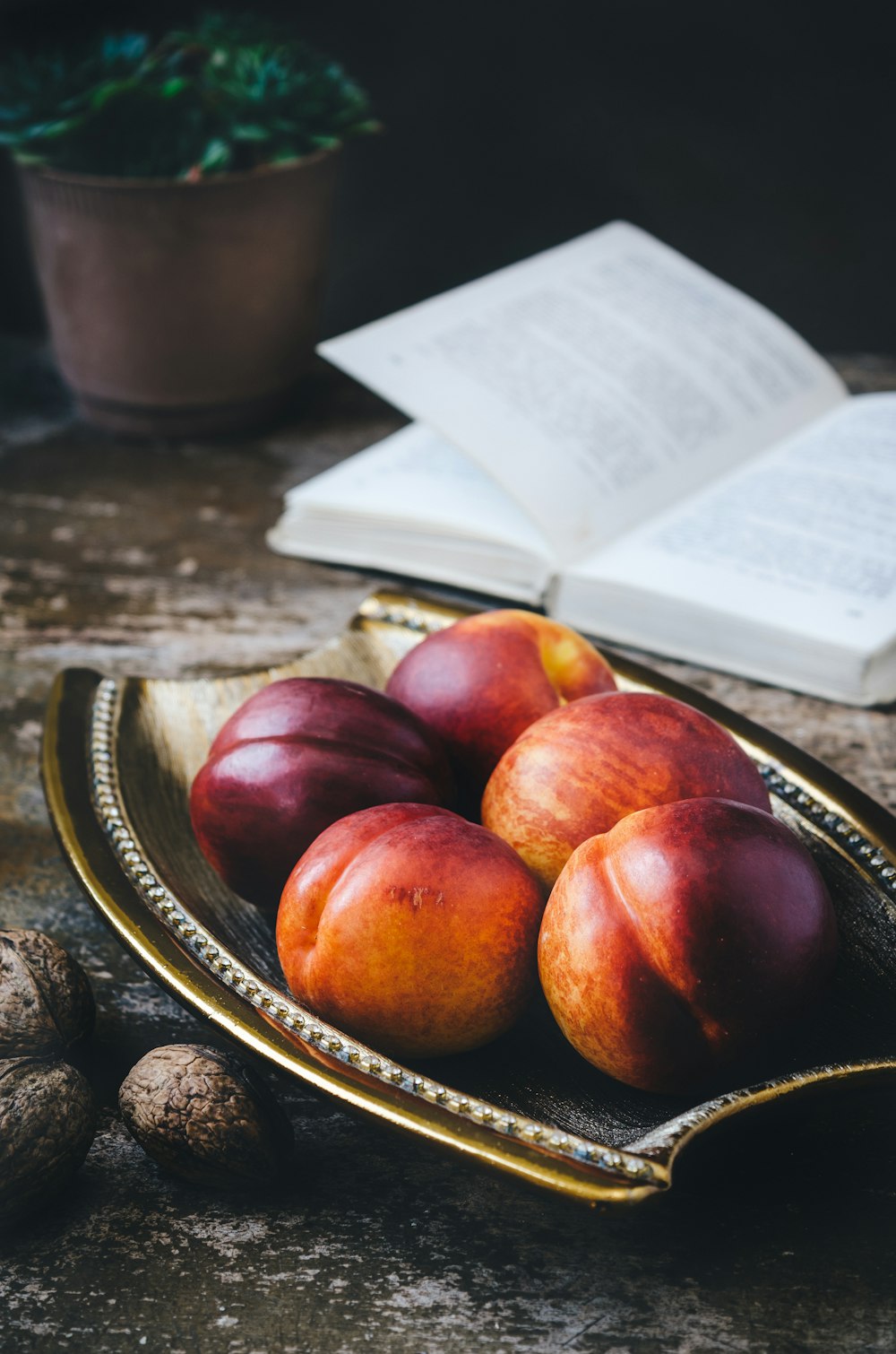 photo of brown fruit on yellow platter