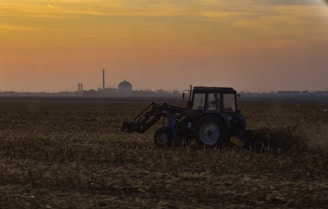 tractor on grass field