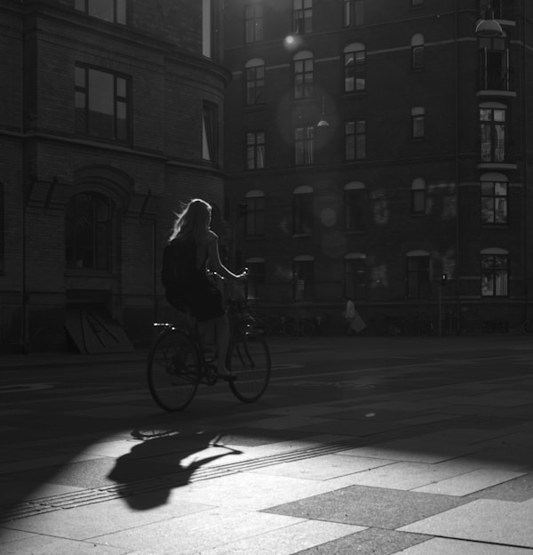 woman sitting on bicycle