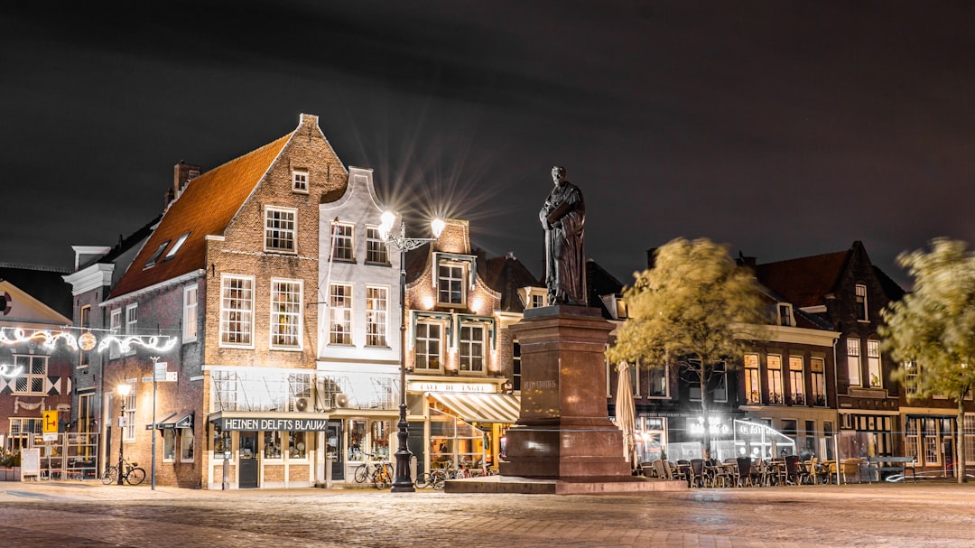 statue of a man outside a building \