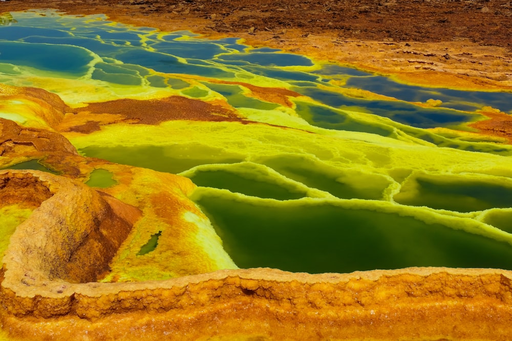 brown, green, and blue land formation