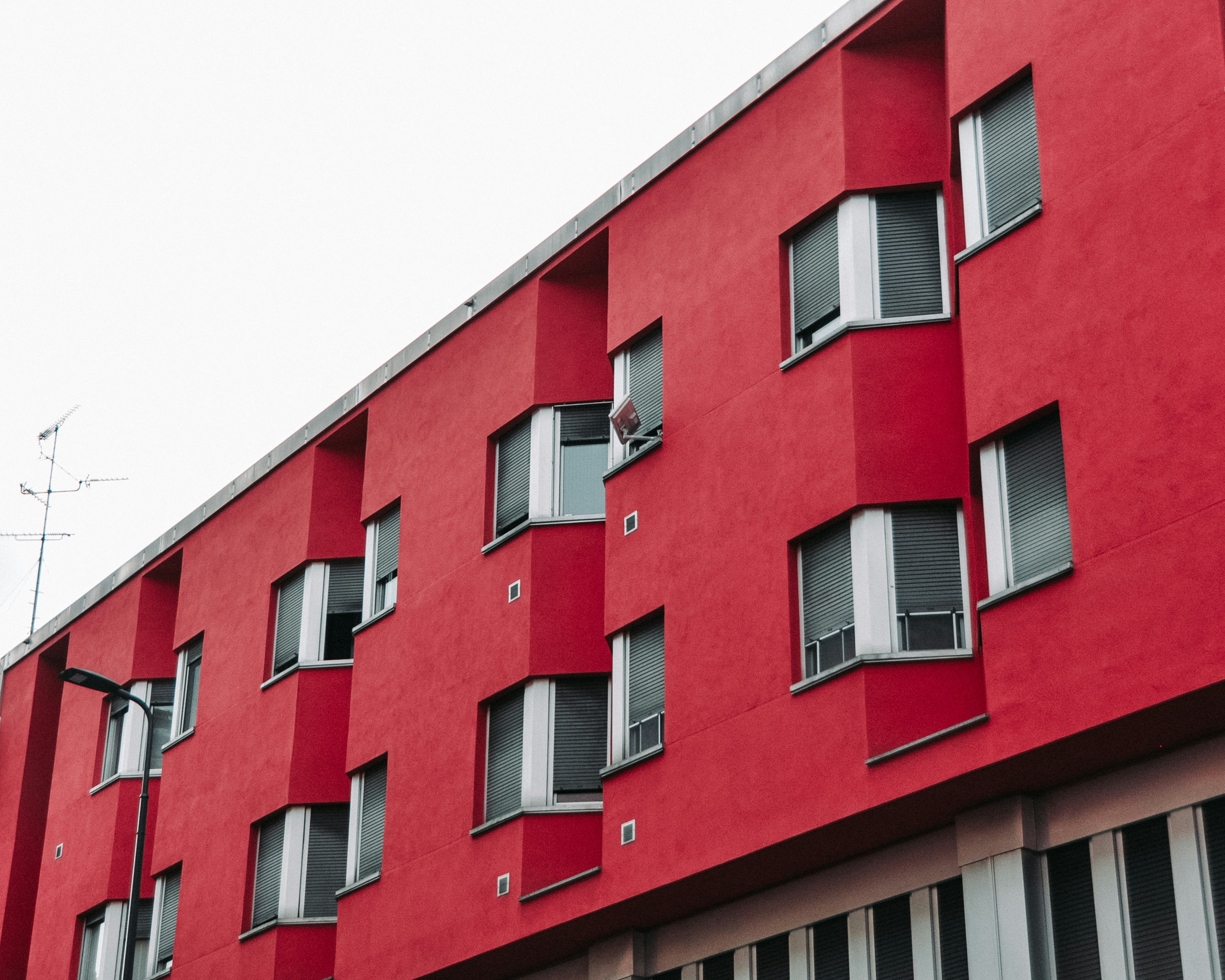 red concrete multi-storey building