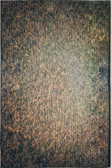 Close-up of a textured blazer fabric with natural earth tones and sturdy stitching