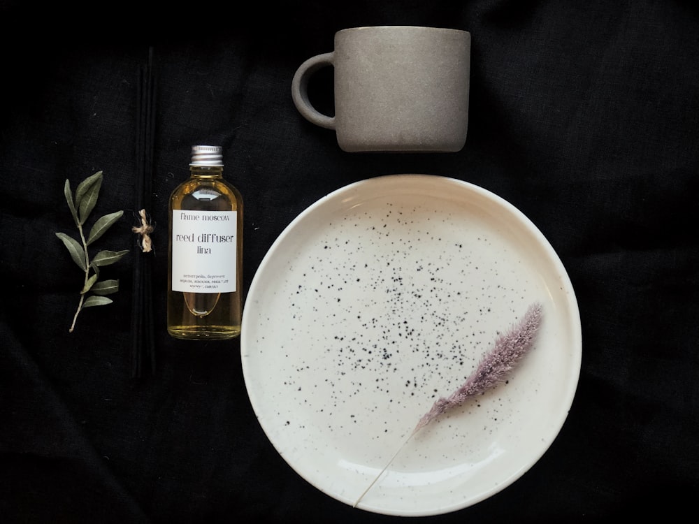 plate, mug and glass bottle