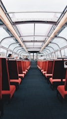 Interior view of a sleek autonomous vehicle with passengers comfortably seated, enjoying a smooth ride.