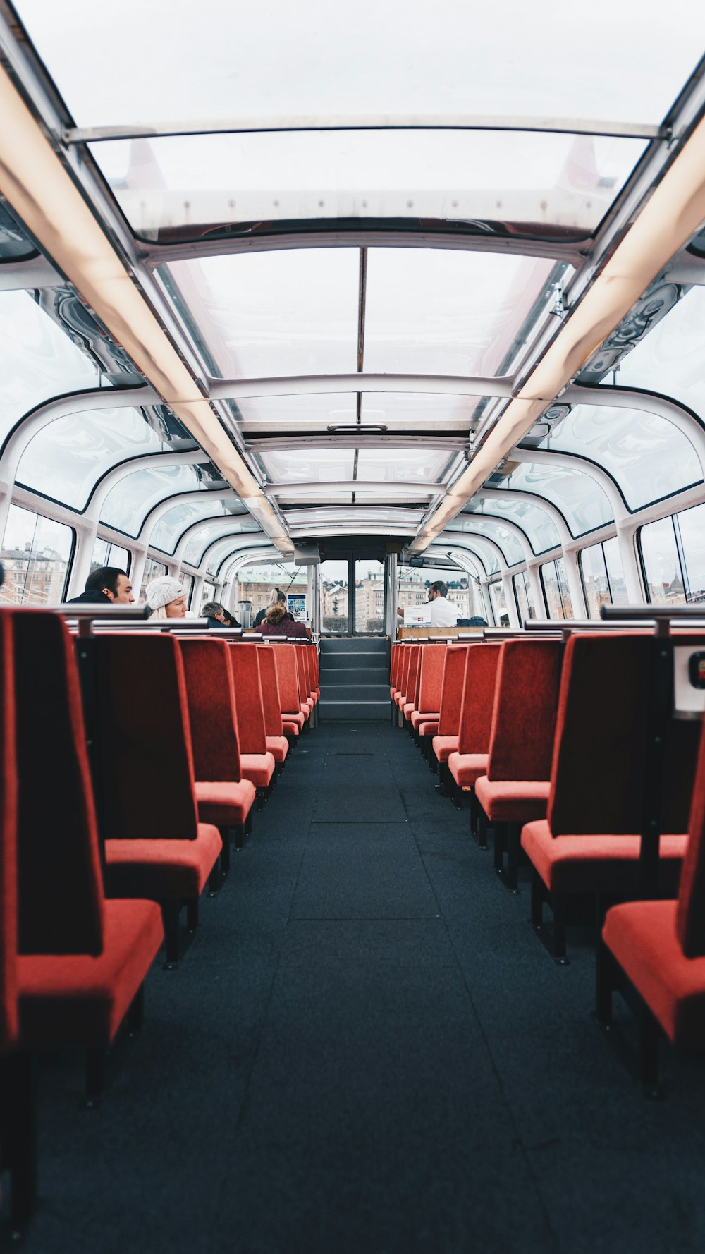 people sitting on passenger seat in the vehicle