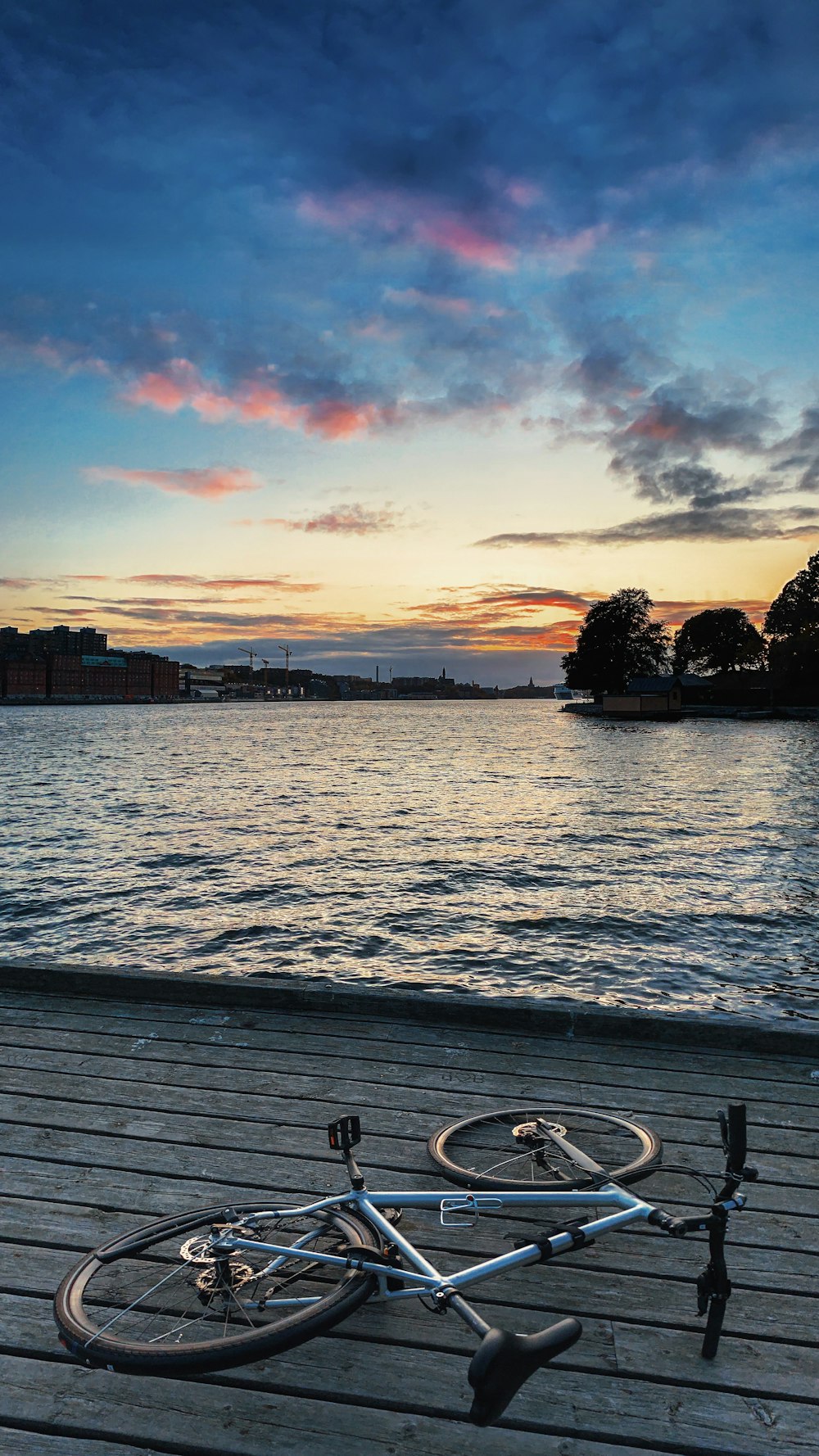 bicycle in a wooden dock by the sea