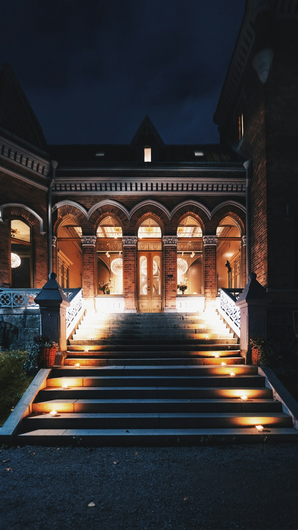 staircase lighted with candles