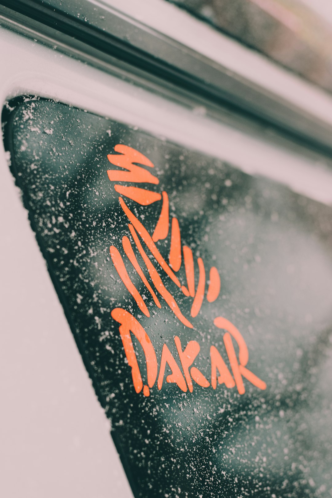 selective focus photography of Dakar vehicle decals