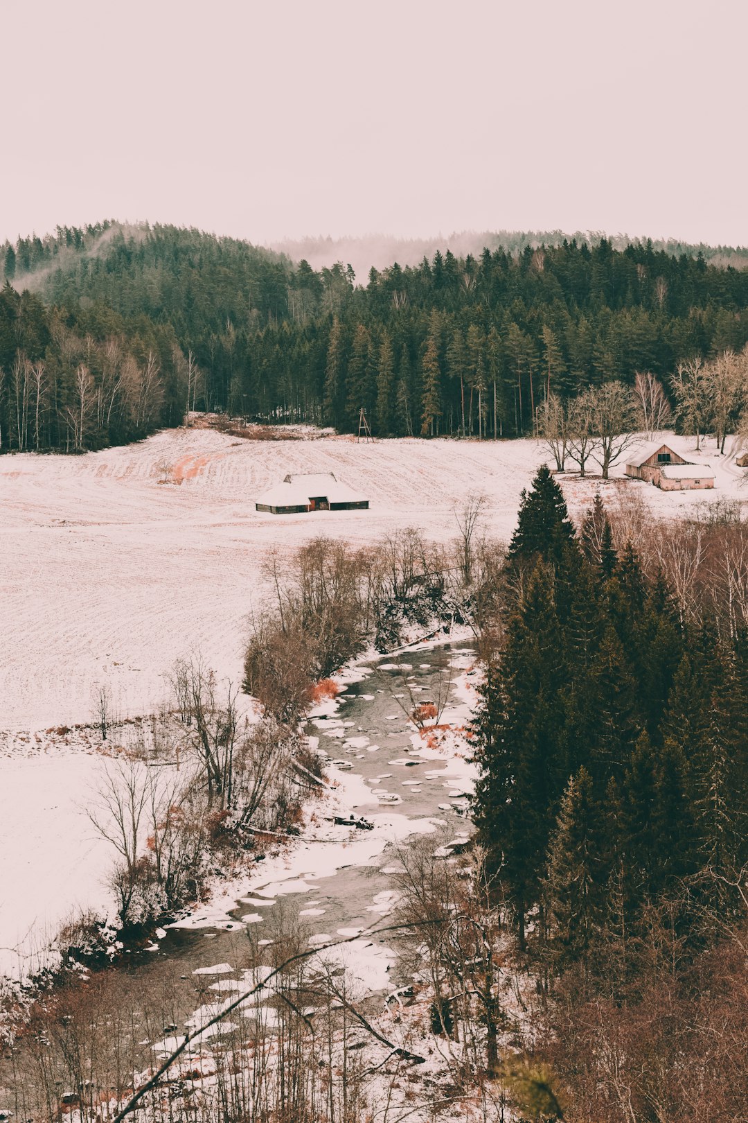 creek, cabins, and trees during winter