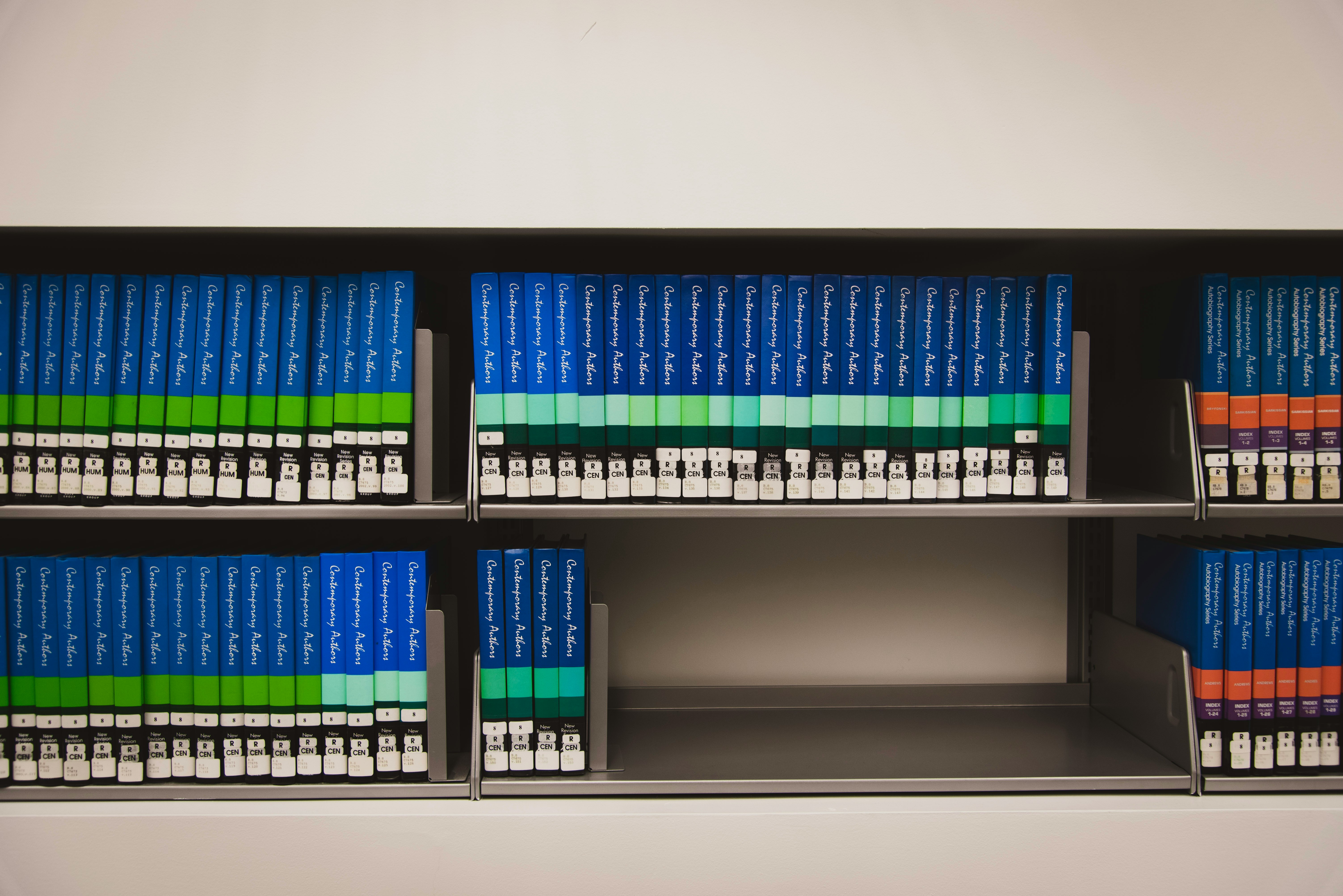 pile of Encyclopedia on shelf