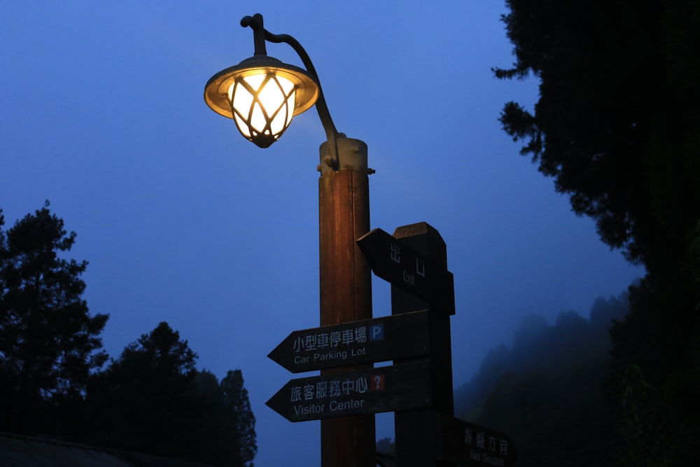 brown wooden base lighted post