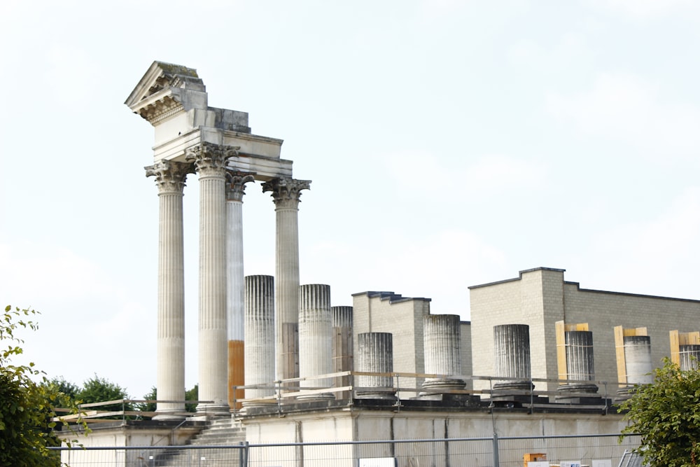 white concrete pillars during daytime