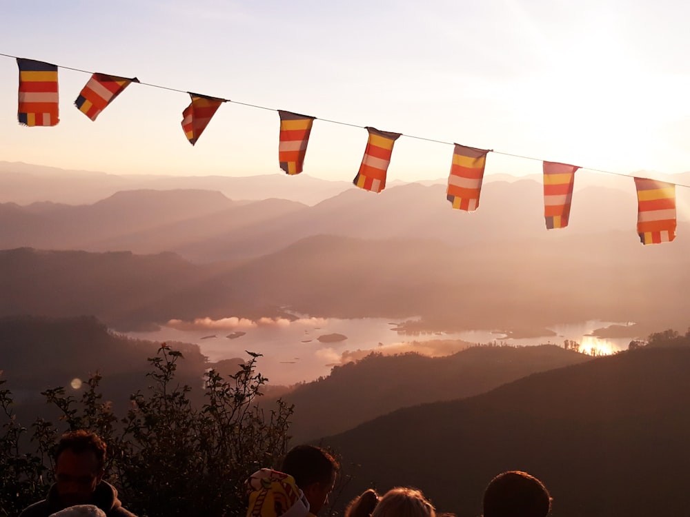 colorful buntings hanging over a group of people