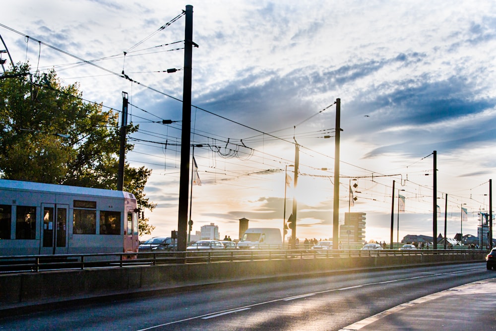 white train on railroad