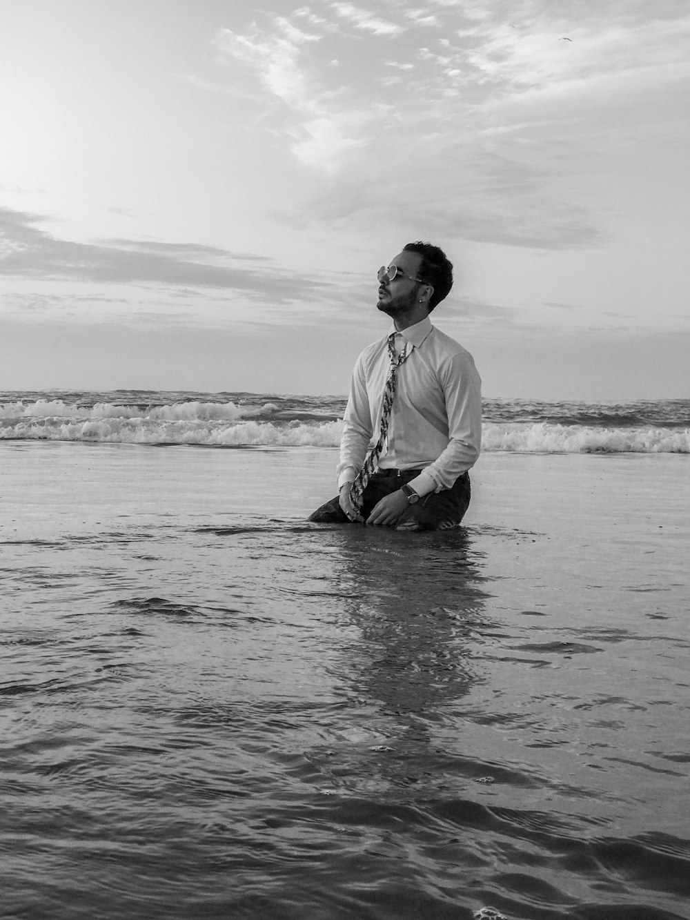 man sitting on body water