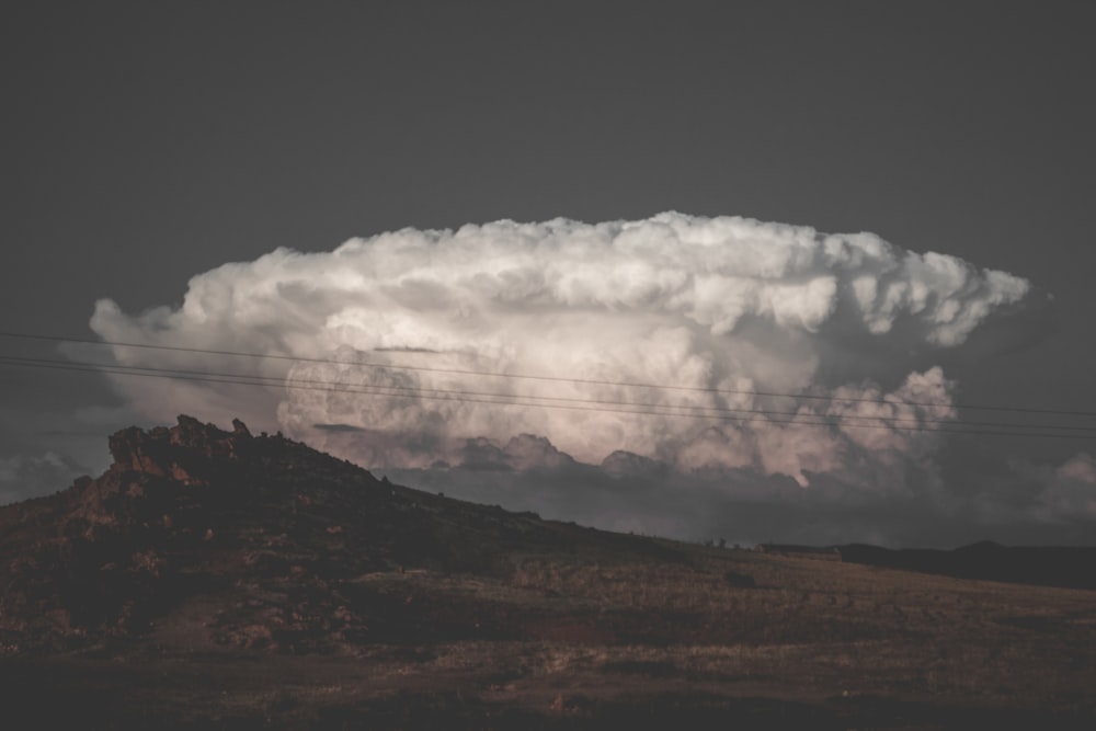 mountain under white cloudy sky