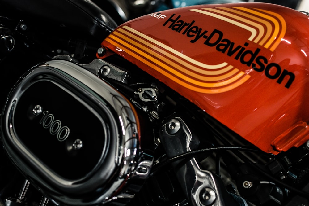 orange and black Harley Davidson motorcycle