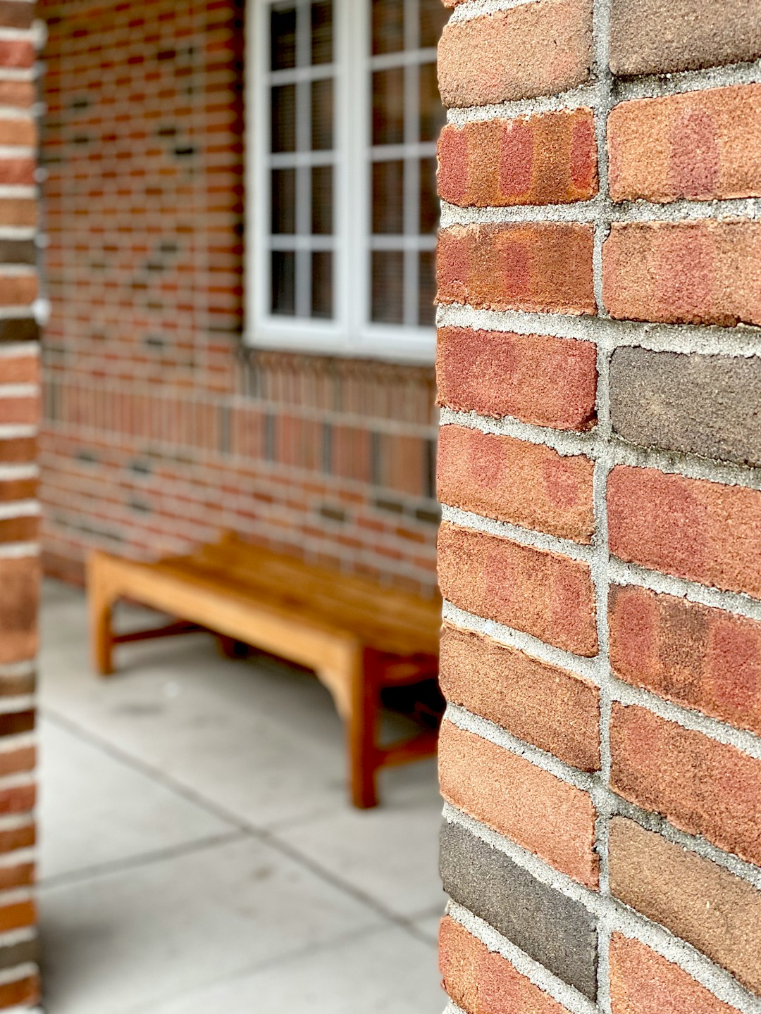 selective focus photo of brick wall