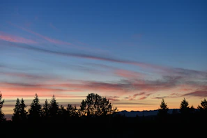 Evening sky painted in soft pinks and purples over the tranquil countryside