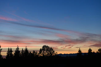 Evening sky painted in soft pinks and purples over the tranquil countryside