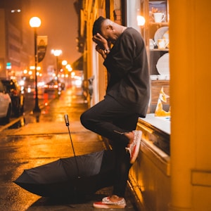 man wearing black shirt and pants