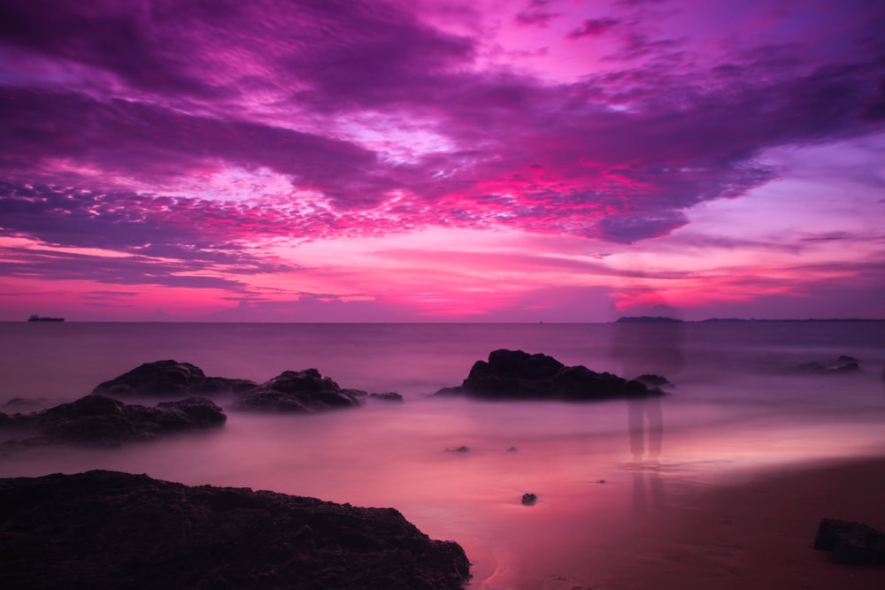 body of water and aurora light