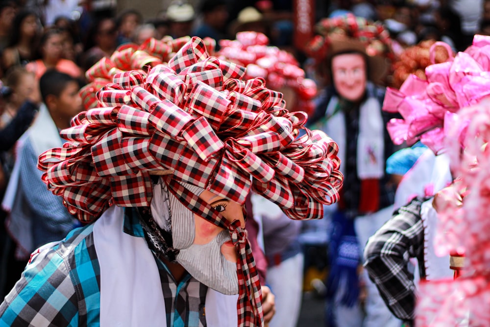 people carrying textiles