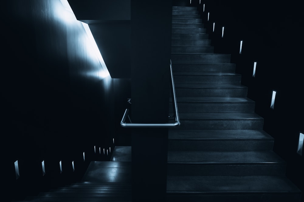 low-angle photography of stairs in dim light
