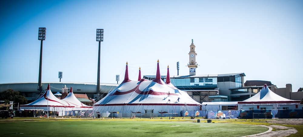 large white tents under blue sky